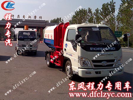 湖北程力東風(fēng)小多利卡多功能噴藥車和福田掛桶式垃圾車經(jīng)過許昌南收費(fèi)站